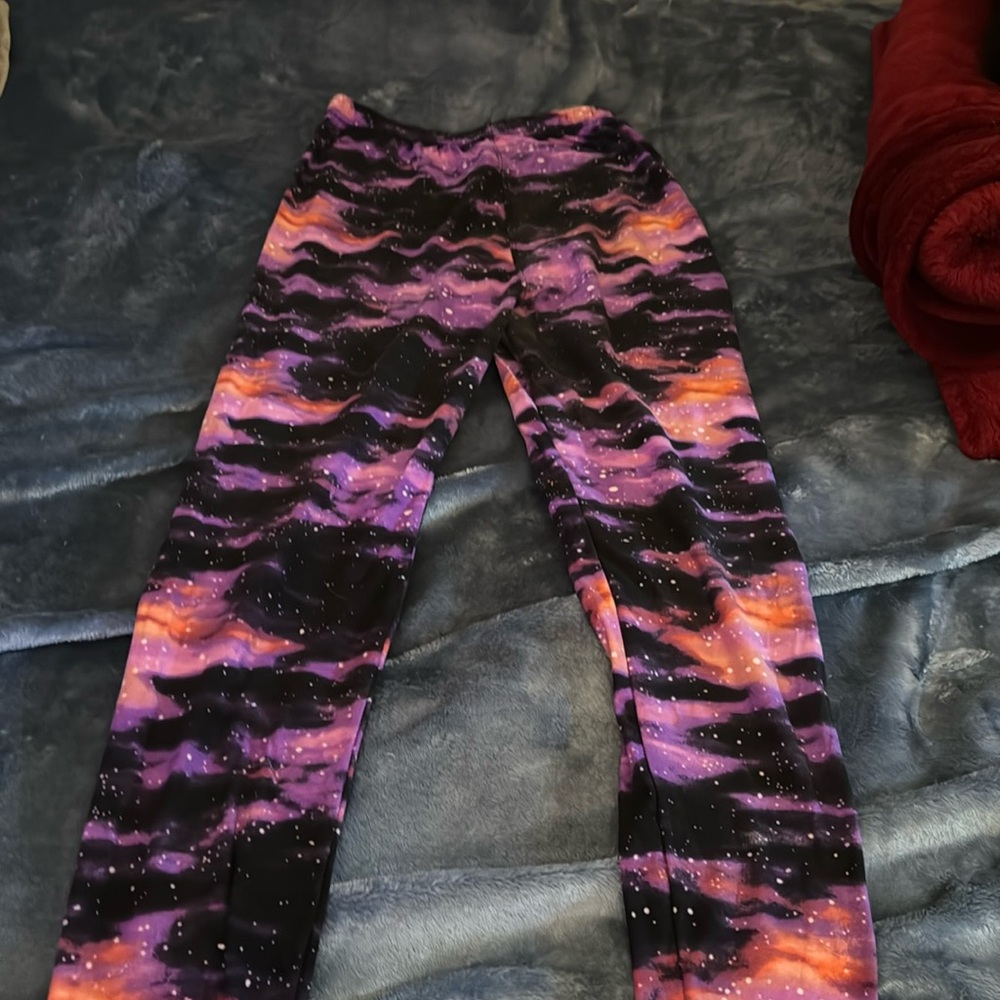 Barely worn purple galaxy leggings. ONE SIZE
